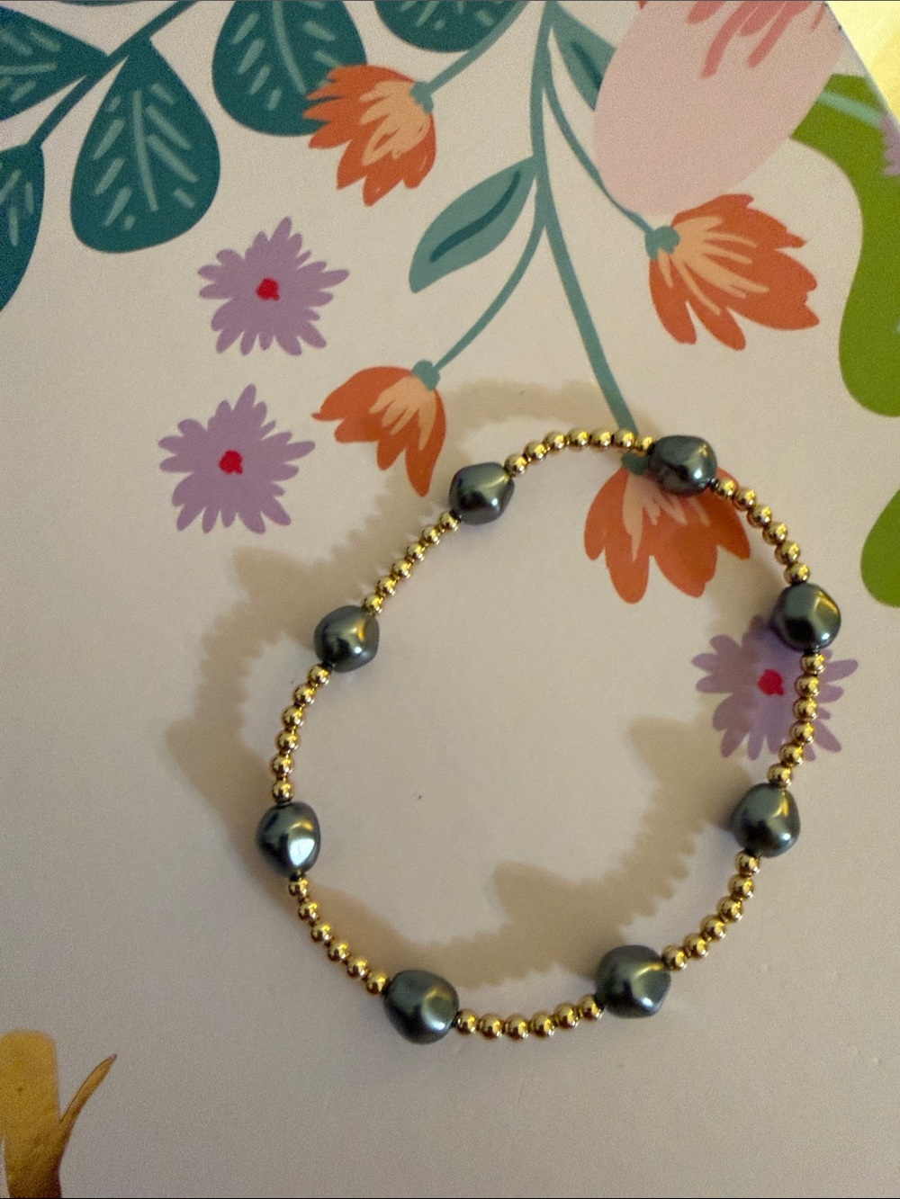 Gold Bead Bracelet with Gray Pearl Accents
